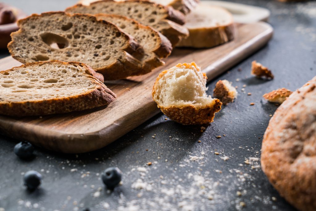 Freshly baked bread on wooden table