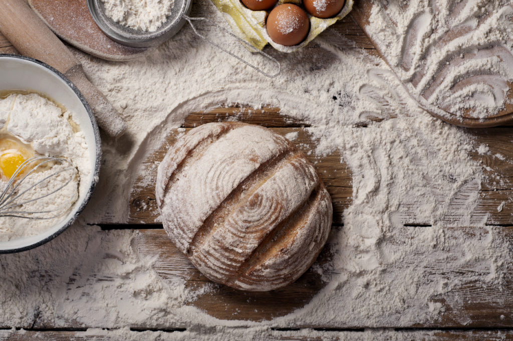 Loaf of bread on a wooden table in a bakery